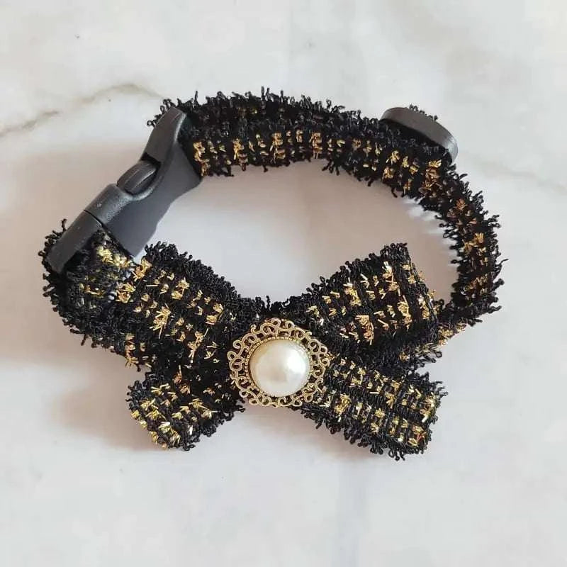 silent cat bow tie collar in black and gold with pearl decoration for stylish cats